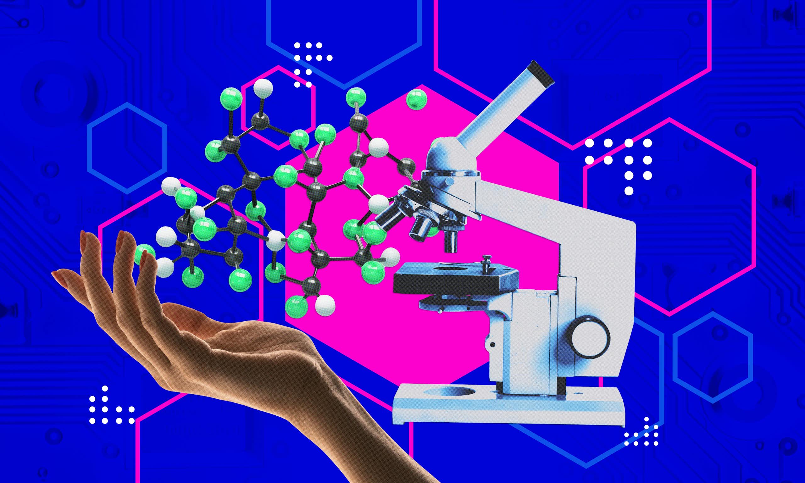 Human hand holding molecular structure next to microscope.