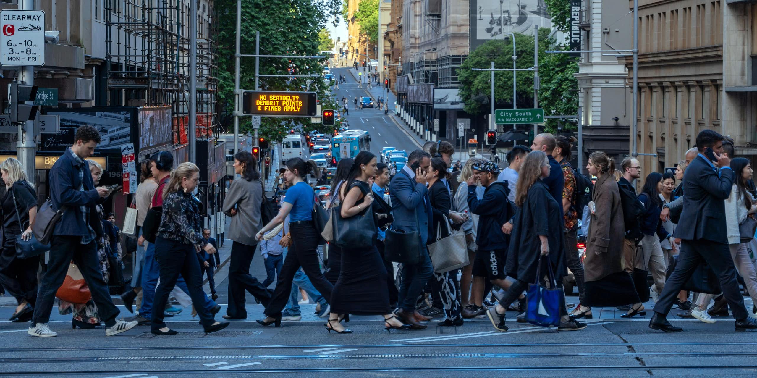 A crowded pedestrian crossing in a city