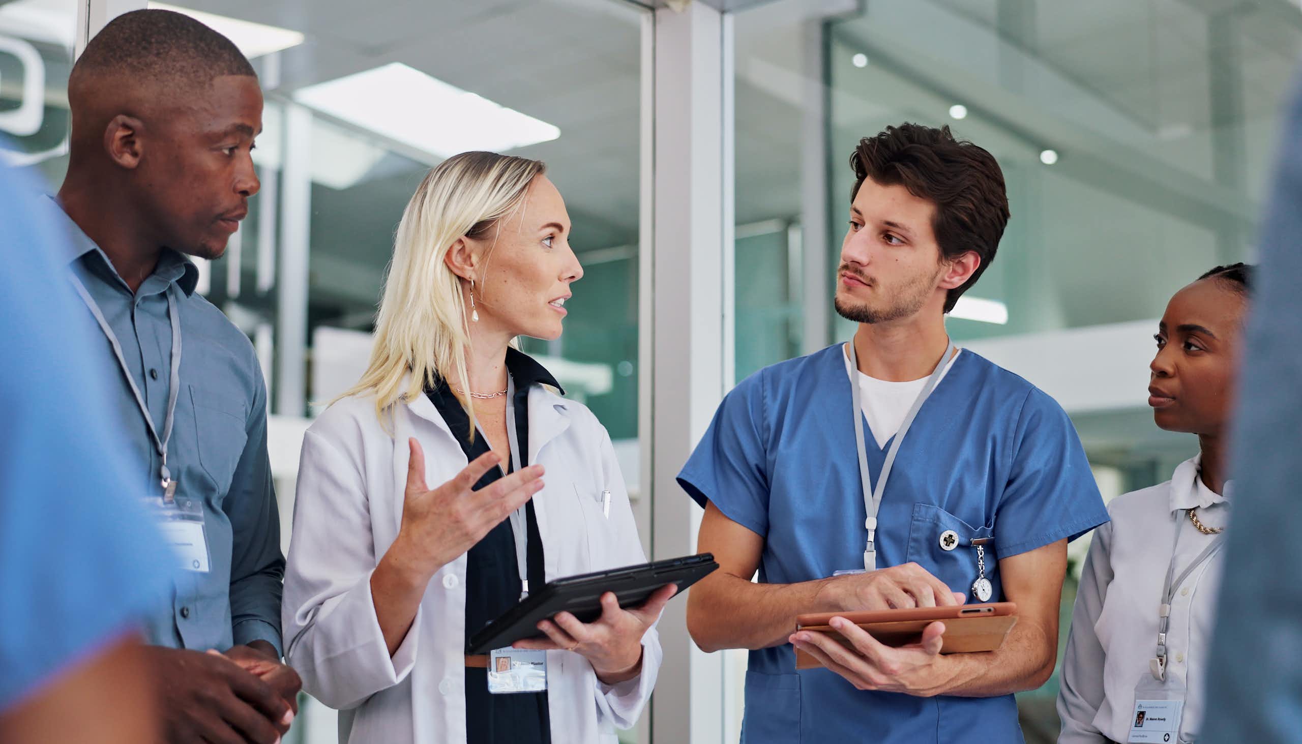 A group of health-care workers talking