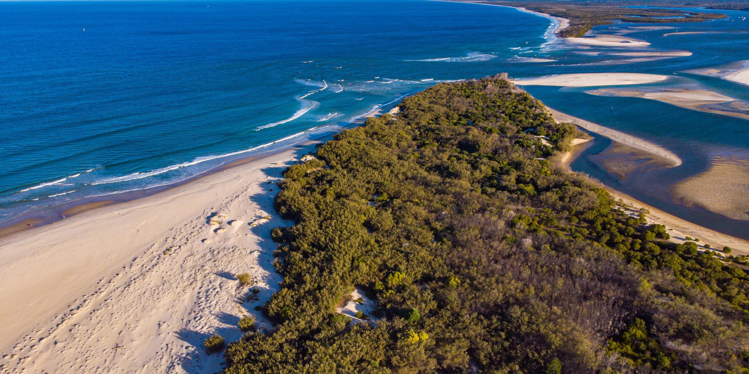 sandy island and ocean