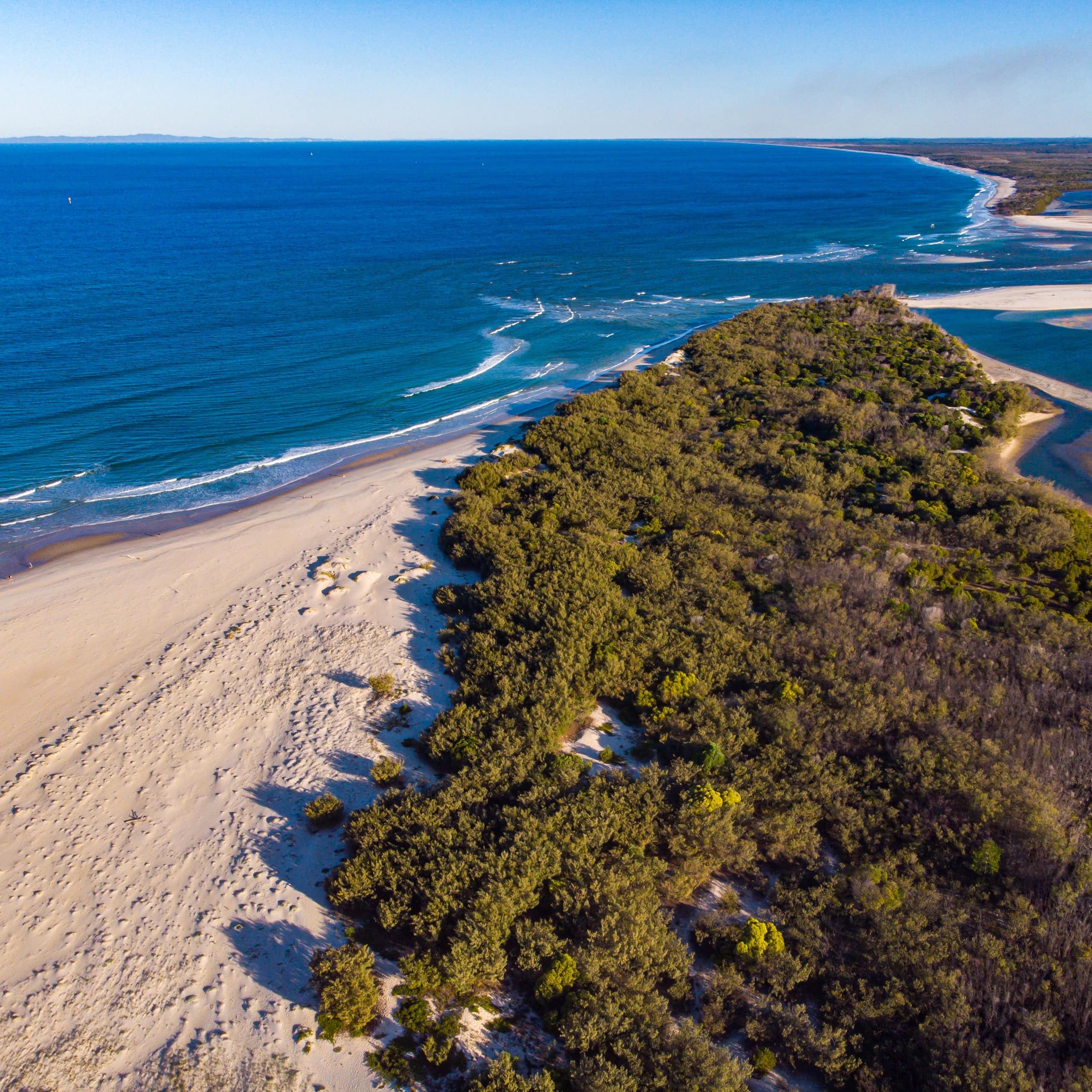 sandy island and ocean