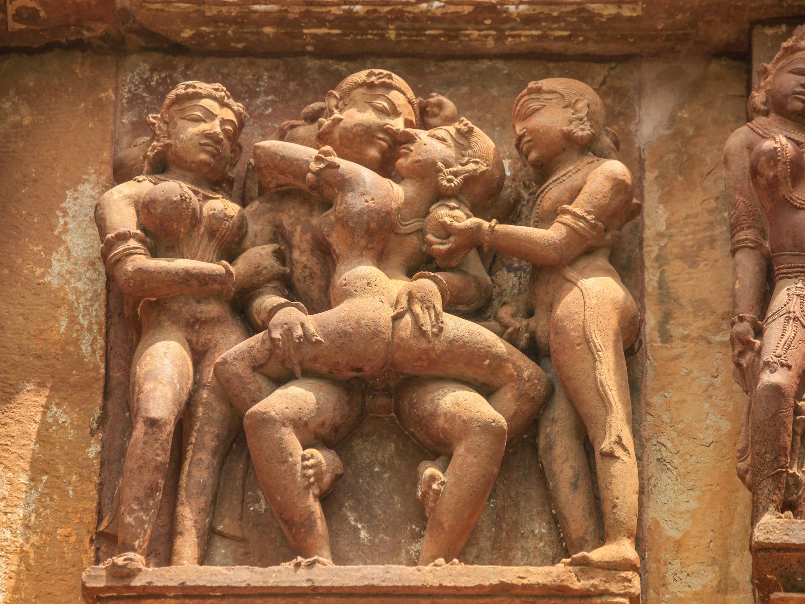An erotic scene on the outer wall of an Indian temple.