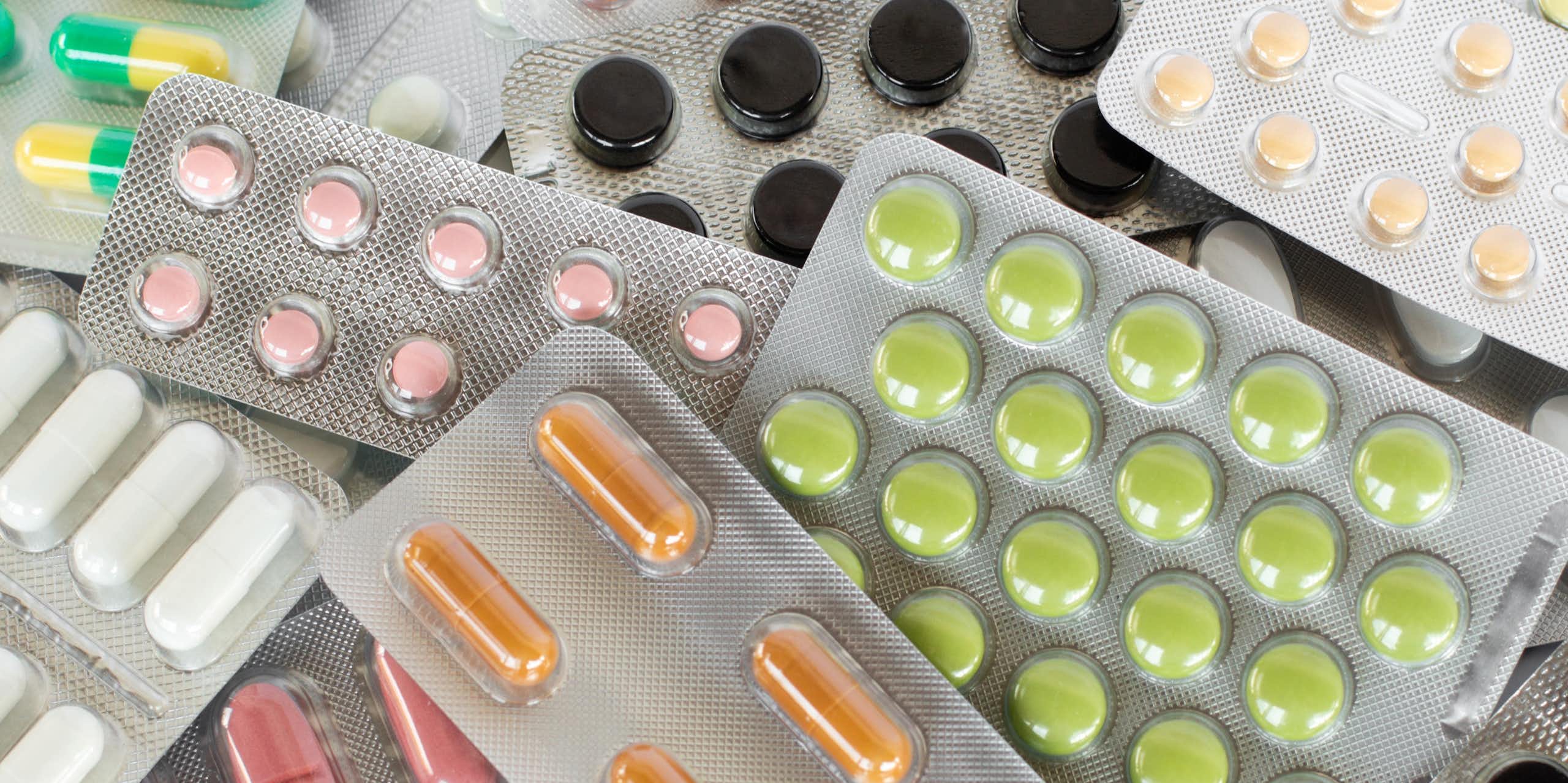 A pile of pills in blister packets