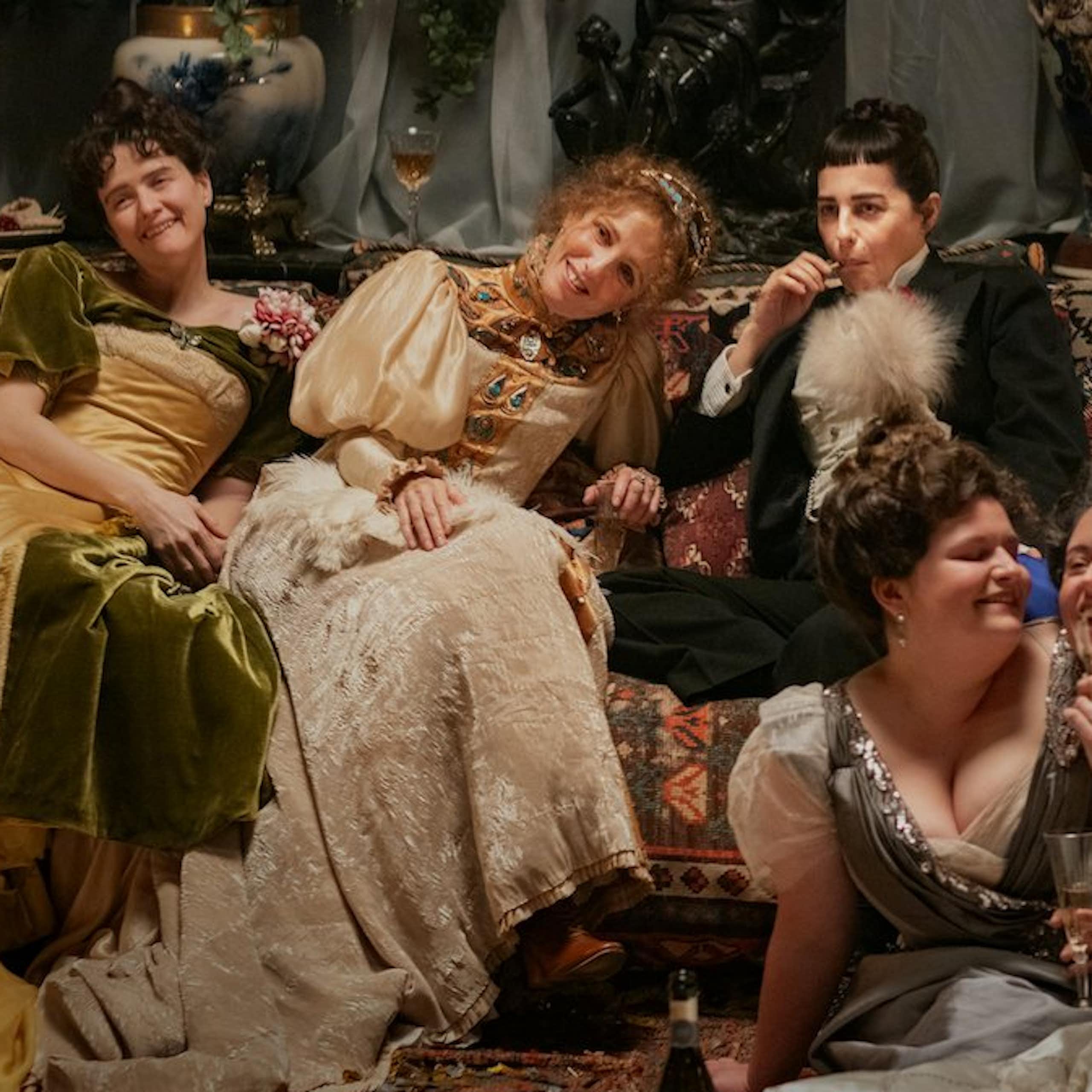 Film still: a gathering of friends at a party in 20th century France.