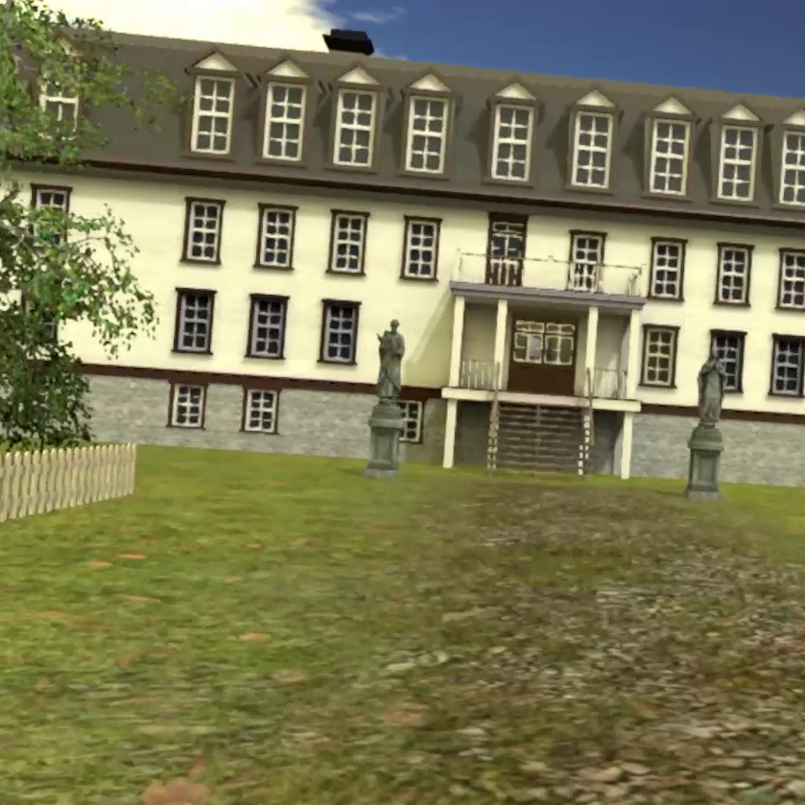 A long, 19th century European style four story building seen with statues in front and grass surrounding it.